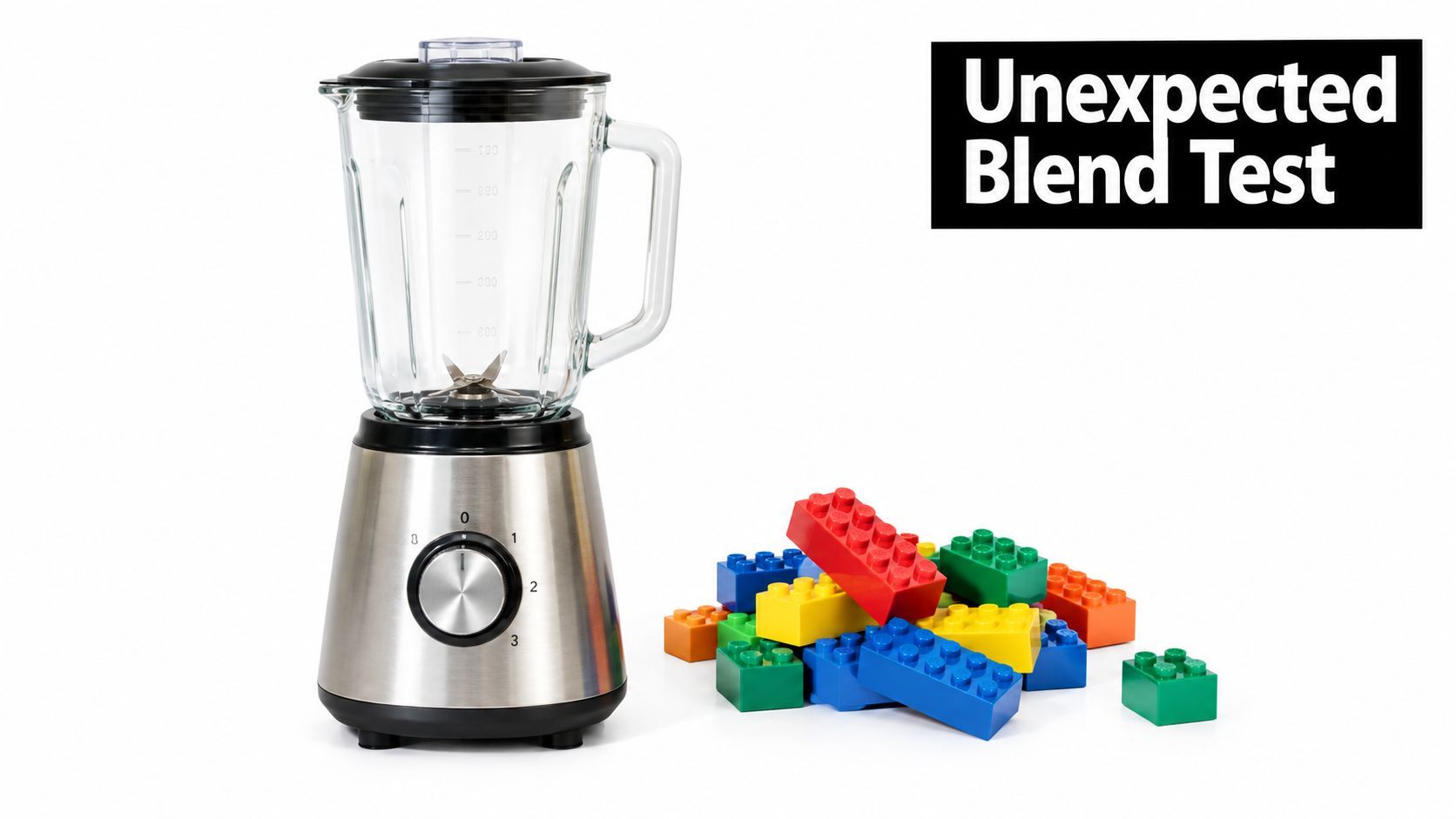 A silver electric blender next to a pile of colorful plastic building bricks on white background.